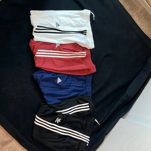 Selling all 4 pairs of adidas pants. Various size.  Used, but in good condition.